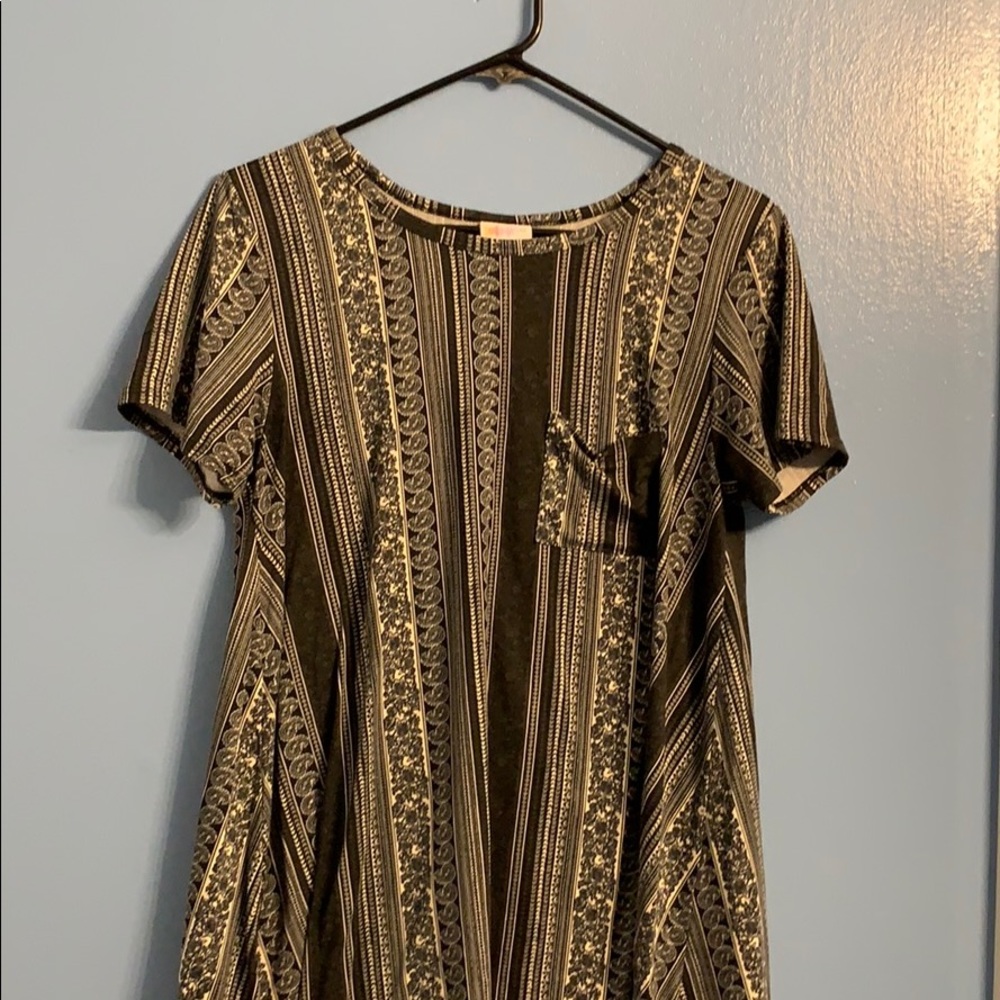 Black and cream Lularoe leggings material Carly S